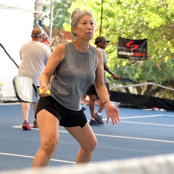 Erika playing pickleball.